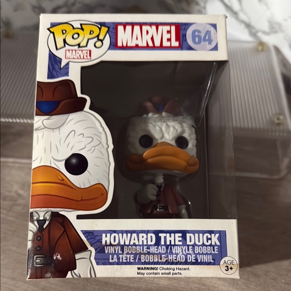 Marvel Pop! Vinyl Figure with Brown Hat.  Water damage on bottom of box